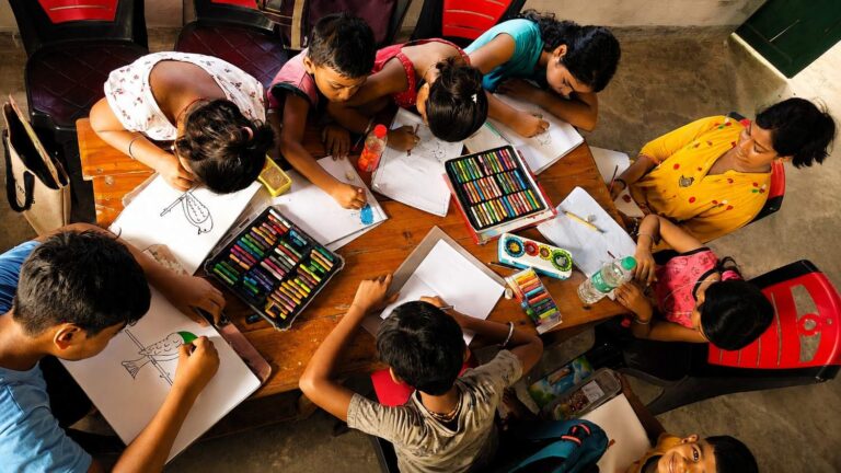 child education support by New Life Fellowship Society's education and community development programs in West Bengal, India.